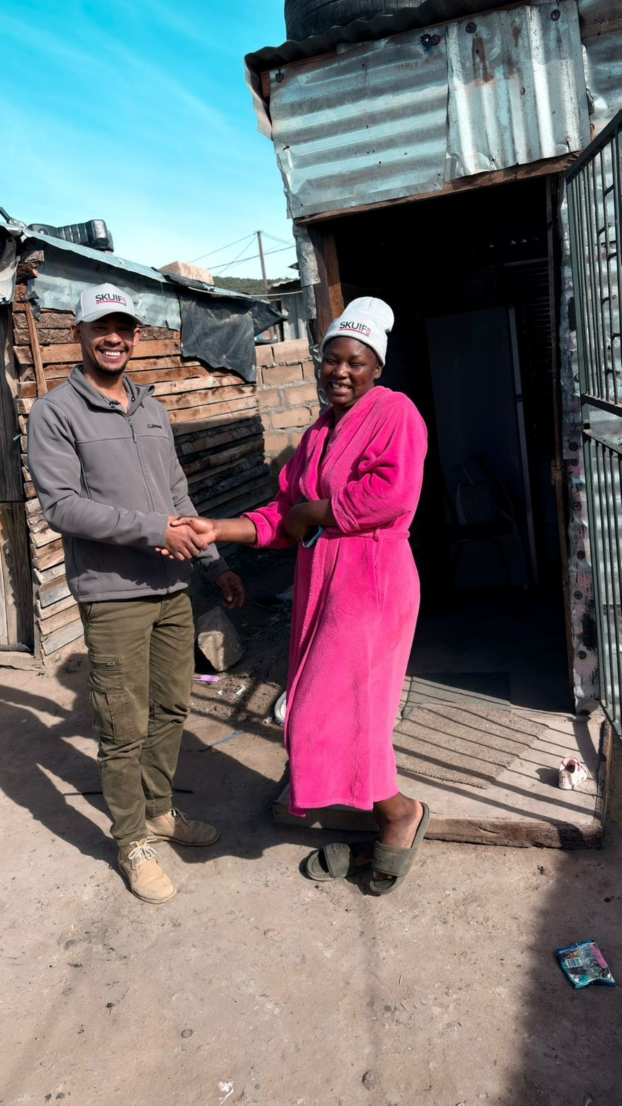 SkuifNet team member Randall meeting a local customer outdoors
