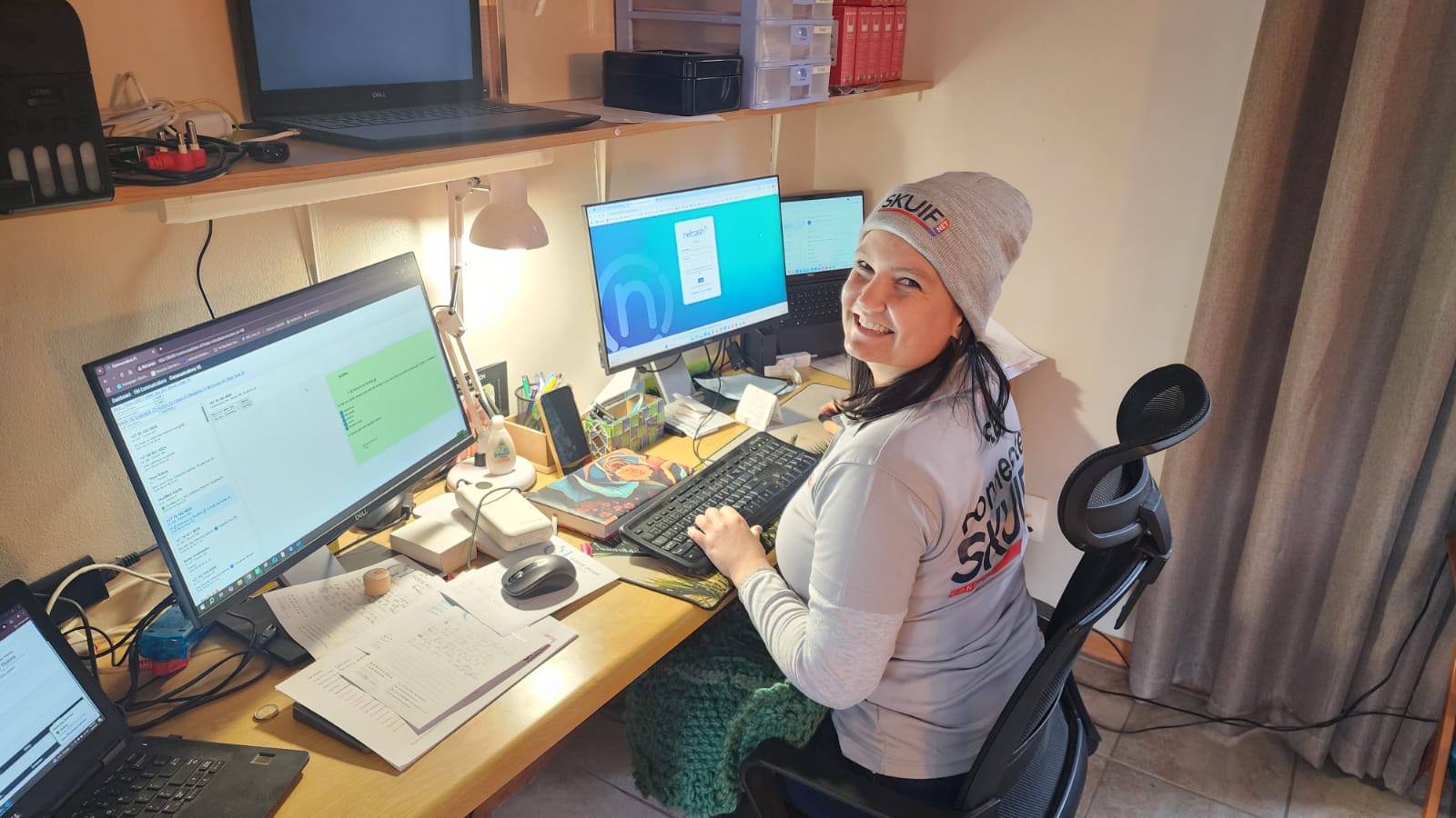 Maruschka at her desk helping SkuifNet customers